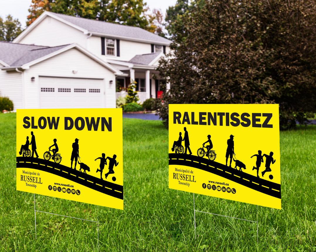 Slow Down lawn sign